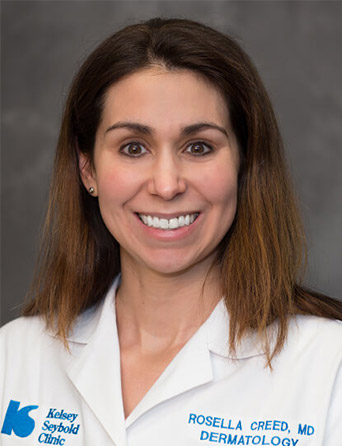 Portrait of Rosella Creed, MD, FAAD, Dermatology specialist at Kelsey-Seybold Clinic.