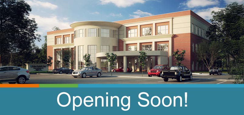 Exterior of Kelsey-Seybold's Rosenberg Clinic with text reading "Opening Soon!"